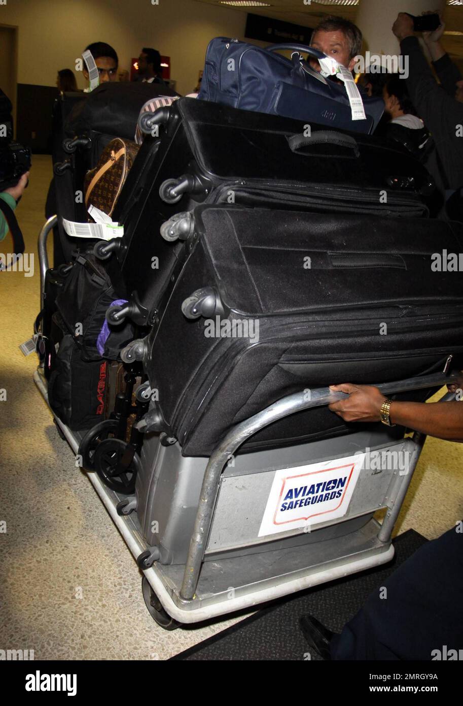 Katie Price (aka Jordan) arrives at LAX with son Harvey in tow after a