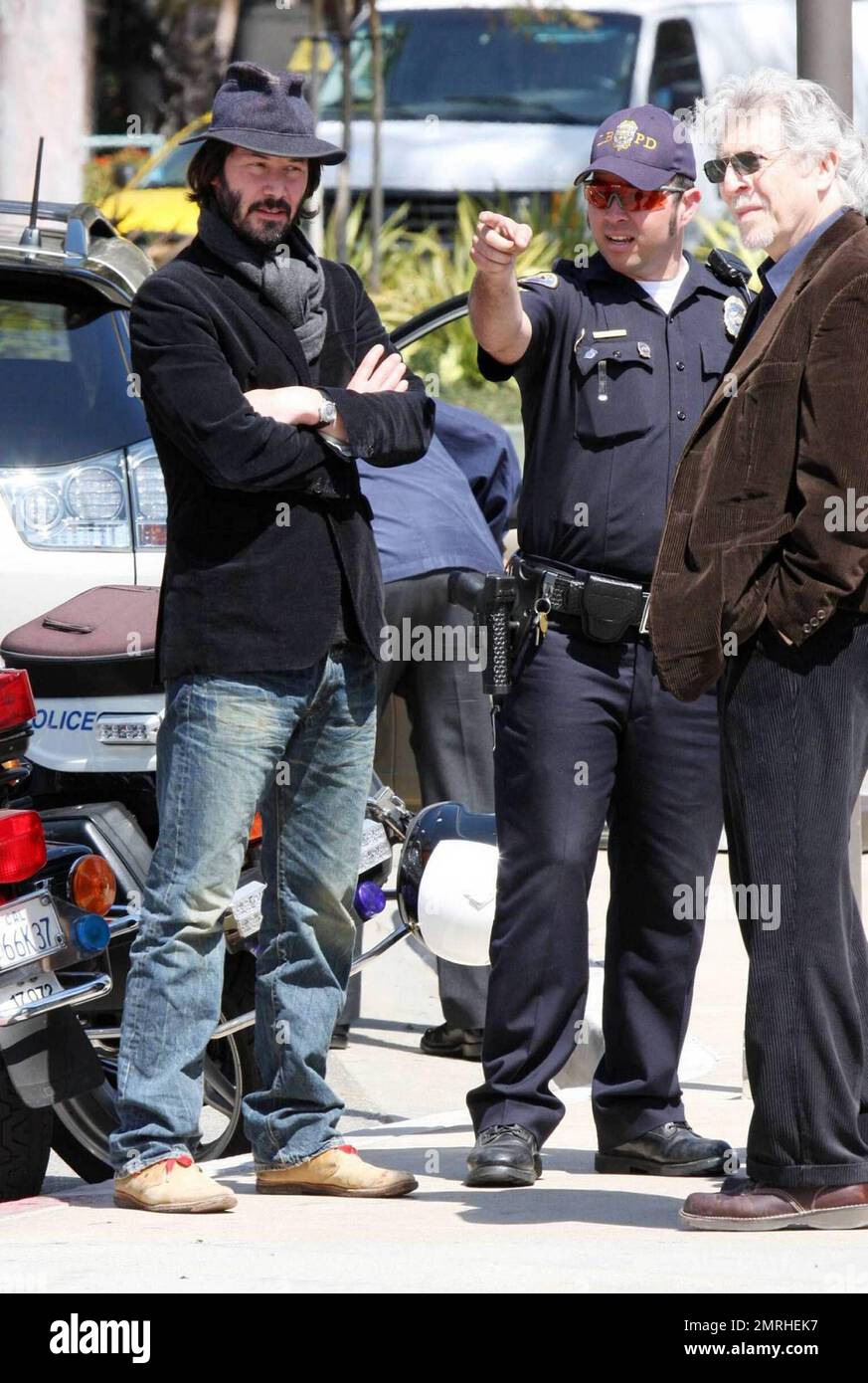 Exclusive!! A smiling Keanu Reeves and buddy Adrien Brody are seen out