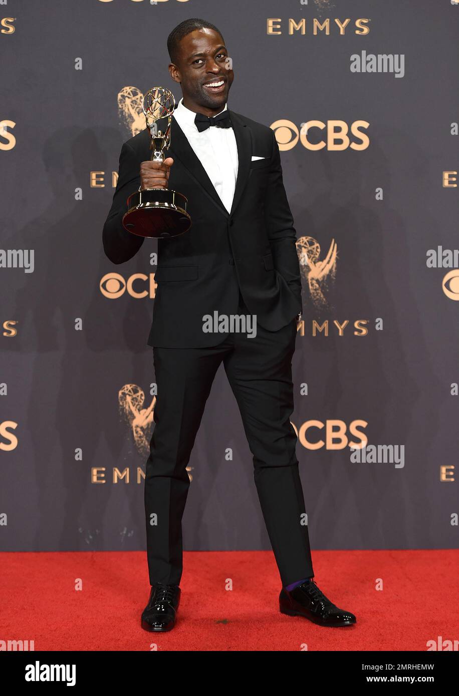 Sterling K. Brown poses in the press room with the award for(02)