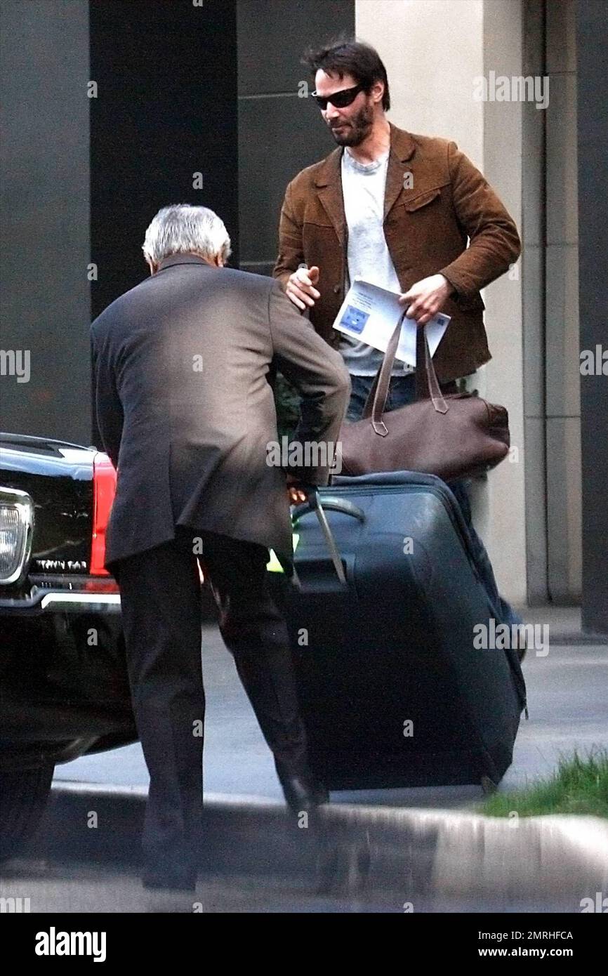 Keanu Reeves departs from Los Angeles International Airport (LAX) carrying Louis  Vuitton luggage, Stock Photo, Picture And Rights Managed Image. Pic.  WEN-WENN22103807