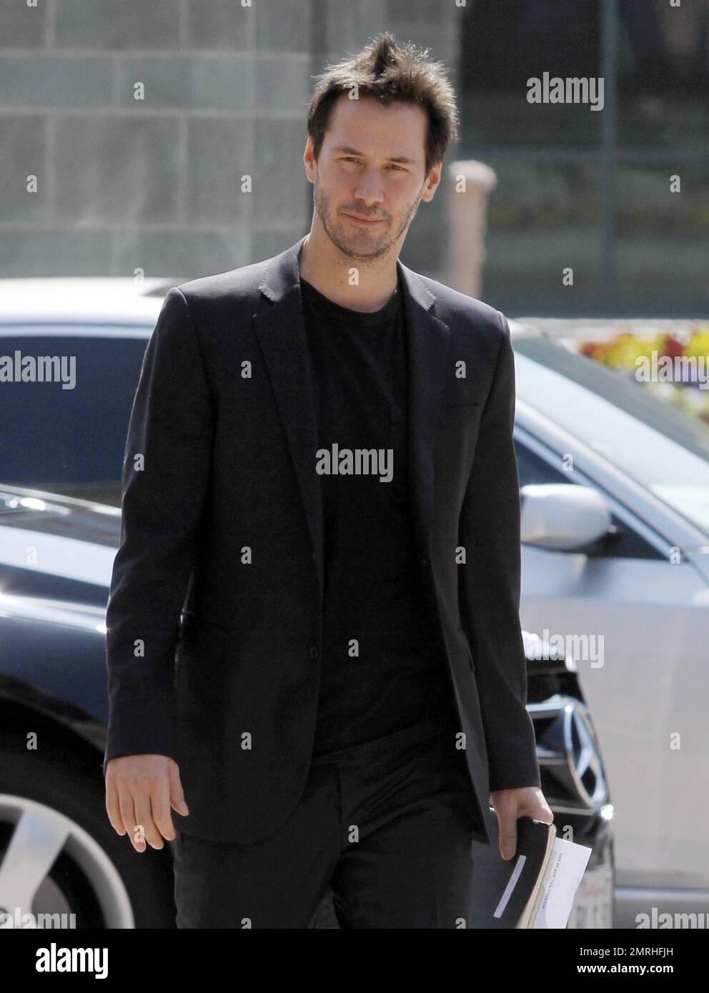 EXCLUSIVE!! Actor Keanu Reeves wears all black paired with some clunky