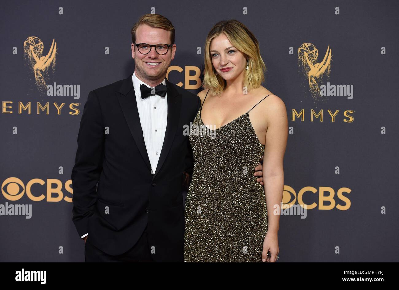 Bill Kennedy, left, and Abby Elliott arrive at the 69th Primetime Emmy