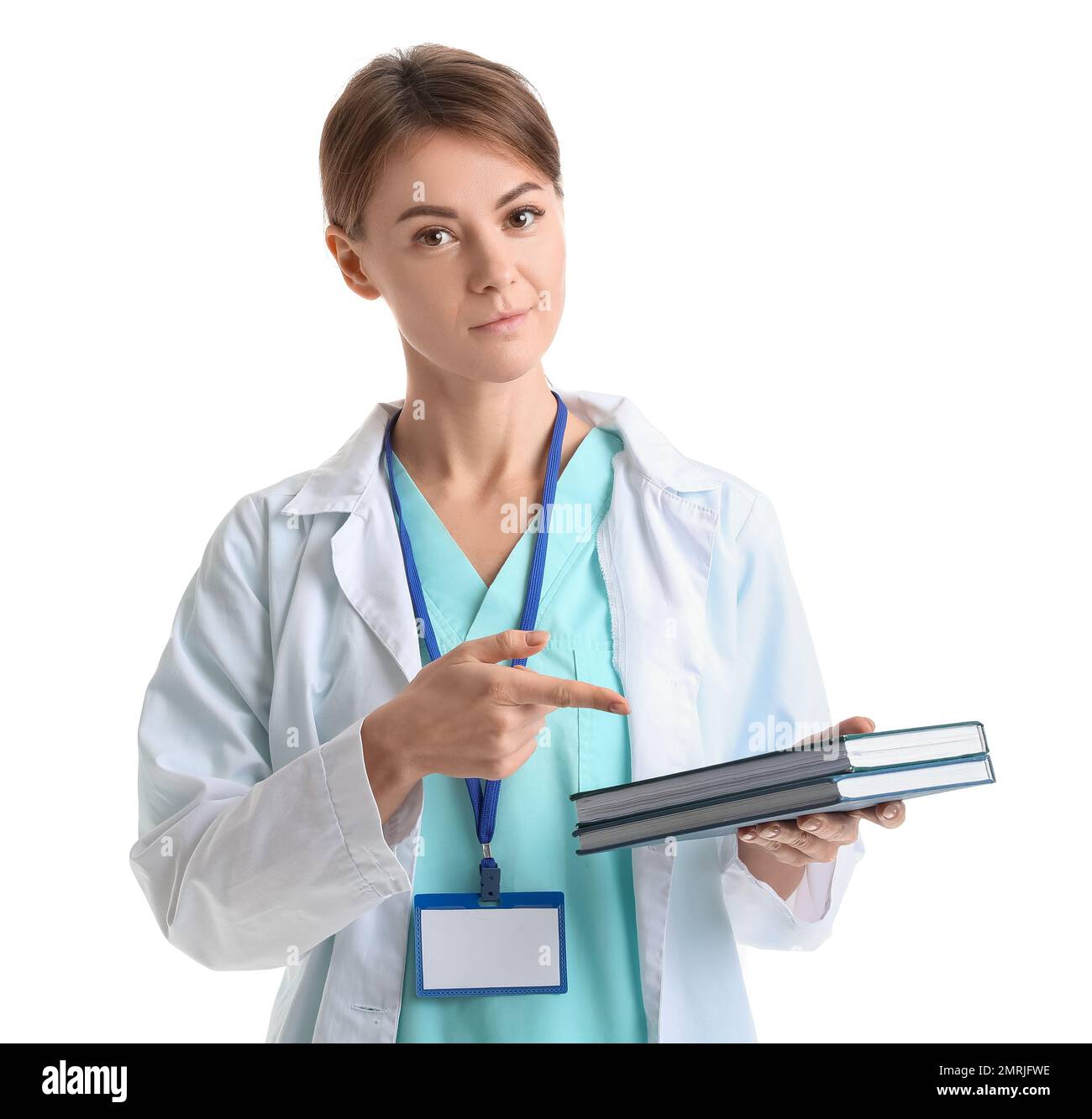 Doctor Point Woman Female doctor pointing at books on white background Stock Photo - Alamy