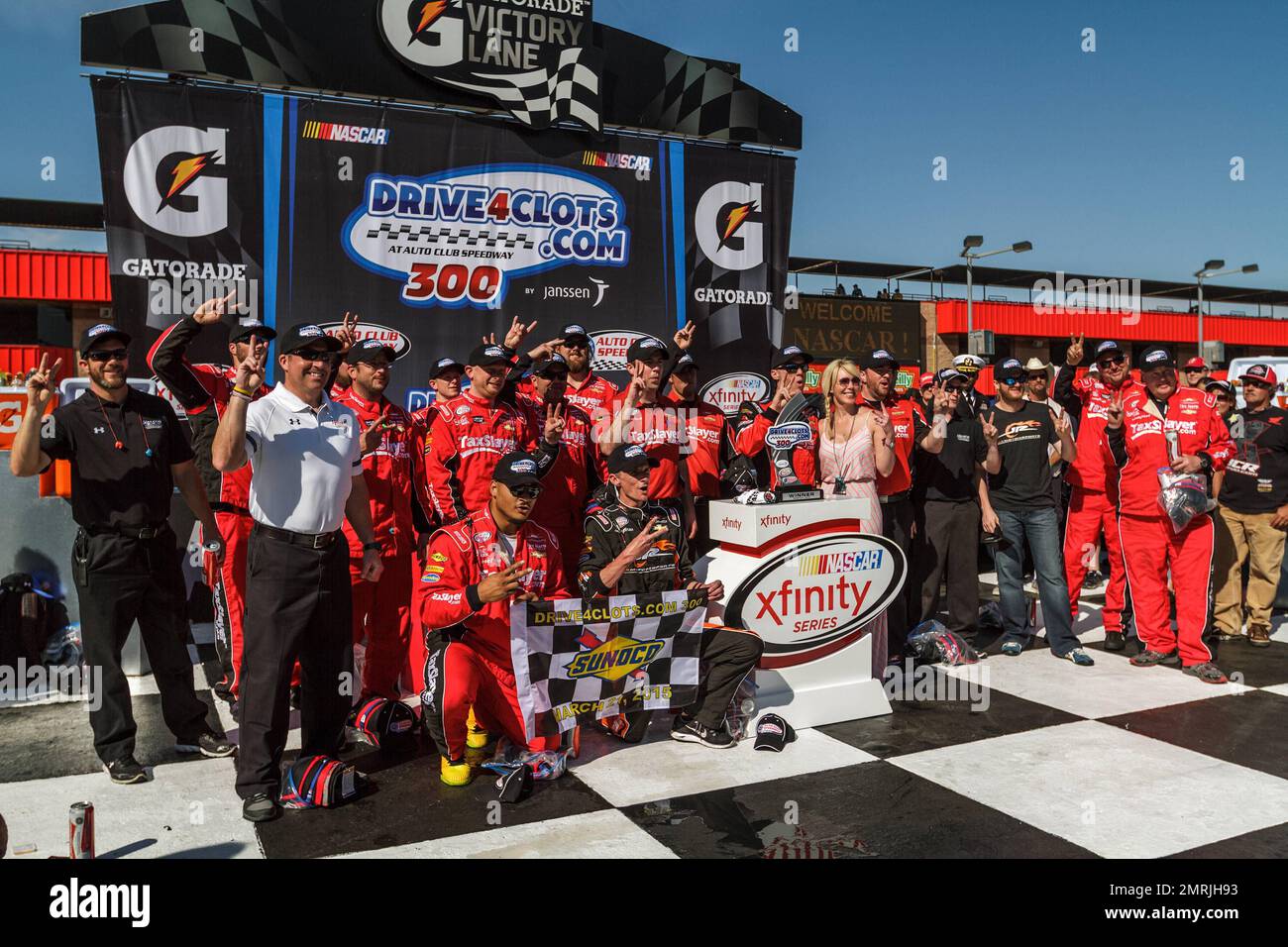 NASCAR Driver Kevin Harvick pulled away from Brendan Gaughan and held on to win the Xfinity Series Drive4Clots.com 300 at Auto Club Speedway on Saturday. It's his 46th career Xfinity Series win but first at the track for the California native. Harvick also now has 12 top-five finishes in 19 races at Fontana. Los Angeles, CA. March 21, 2015. Stock Photo