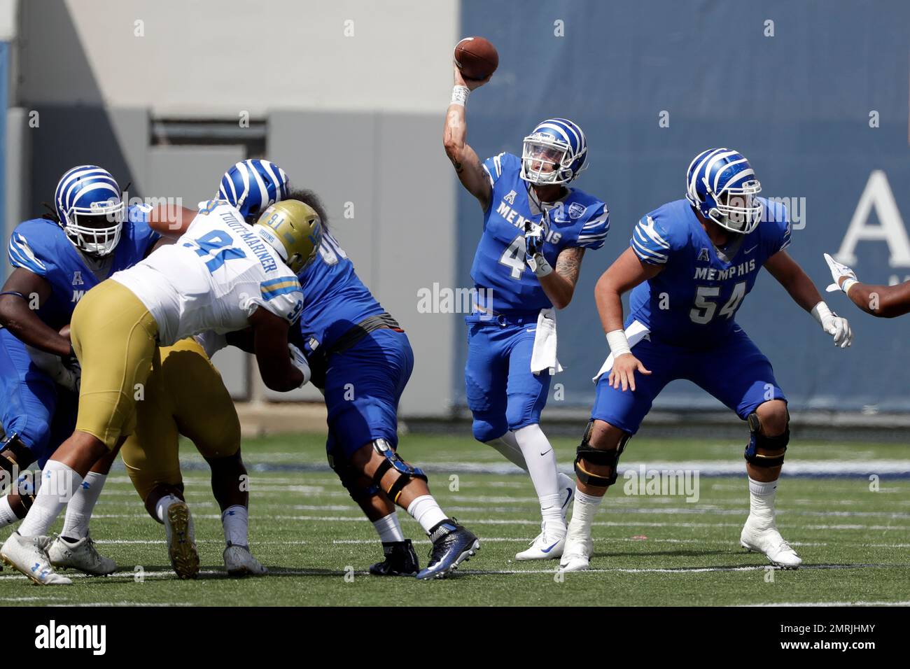Memphis quarterback Riley Ferguson (4) passes against UCLA in the ...
