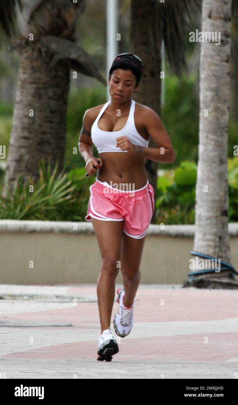 Exclusive!! R&B Singer songwriter Keyshia Cole goes jogging with a freind  on Miami Beach, FL, 7/1/08 Stock Photo - Alamy