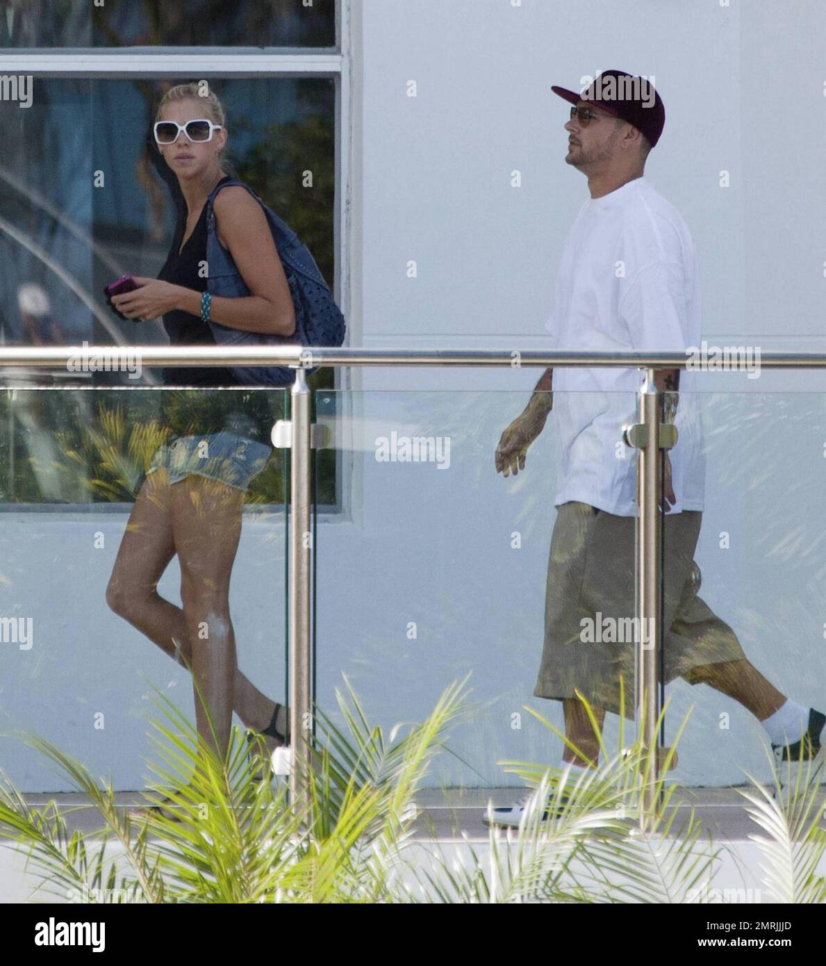 Kevin Federline, grabs a drink after a walk along the boardwalk with
