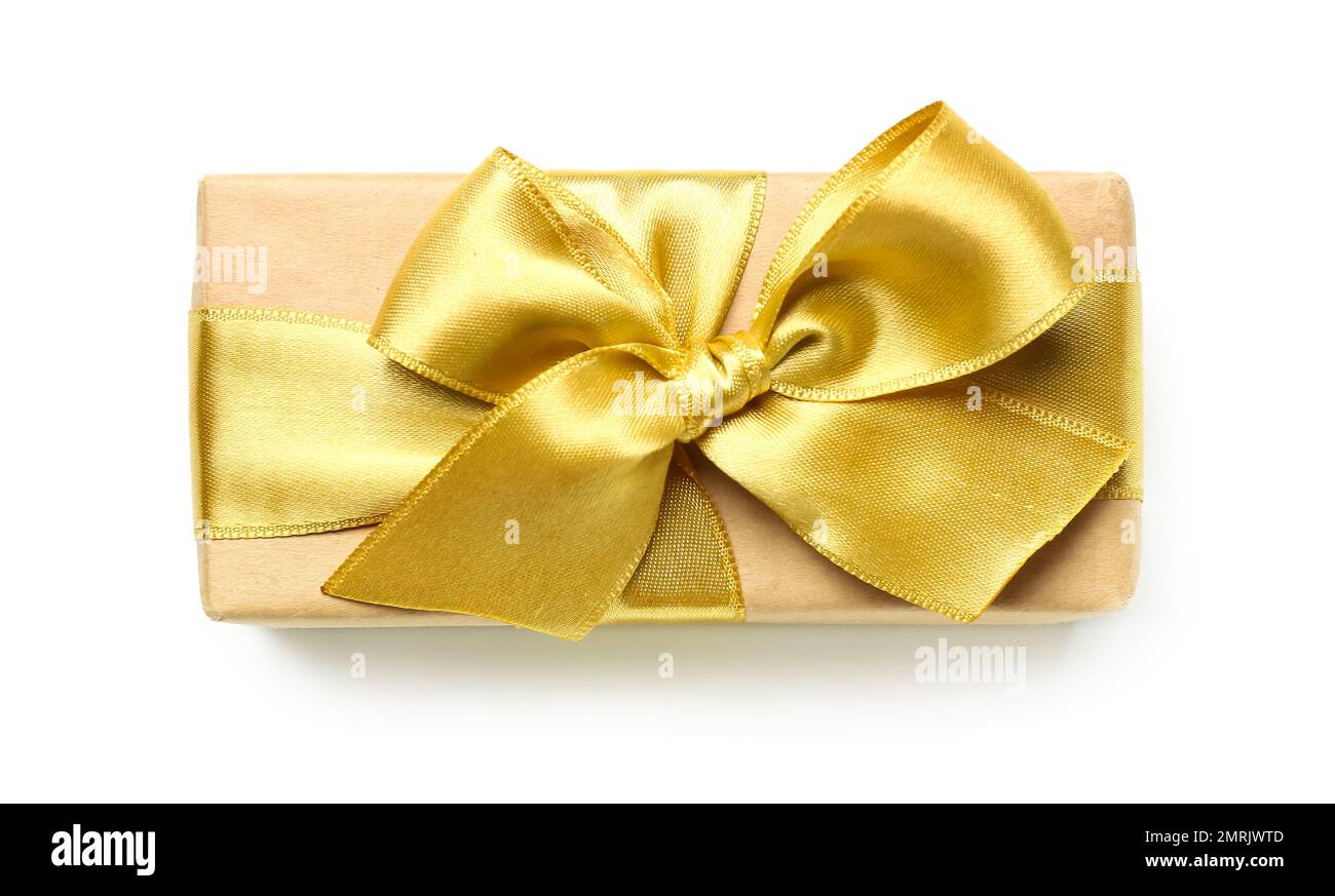 Gift box with golden bow on white background Stock Photo - Alamy