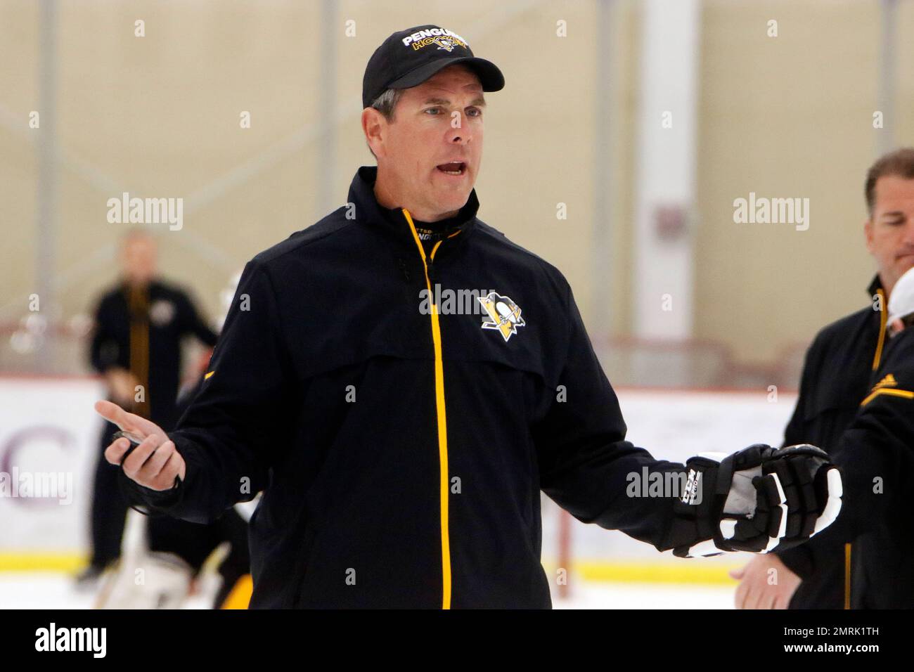 Pittsburgh Penguins coach Mike Sullivan runs a conditioning drill