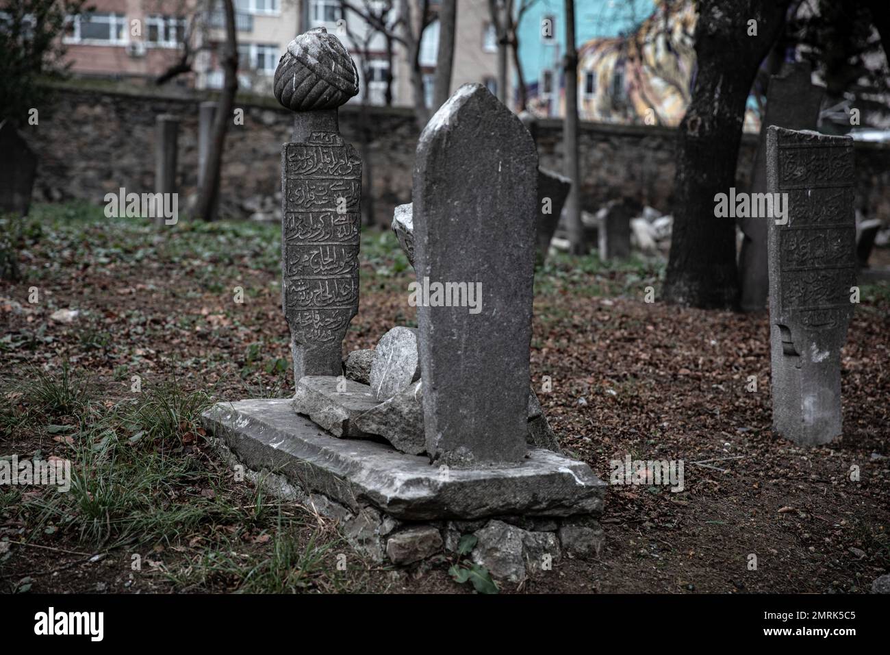 Broken headstones were left on the grave. It is seen that the 400-year-old historical cemetery in Kadikoy is neglected. The Ayrilik Cesme Cemetery, which is the last part of the Karacaahmet Cemetery in Istanbul Uskudar and contains the graves of the names who served in the Ottoman Palace, has turned into ruins. It is known that the burial process in the cemetery, where the first burials were made 400 years ago, continued until the beginning of the 20th century. The cemetery, where most of the tombstones were destroyed, some of the heads fell off, and in some places the stones were planted coll Stock Photo