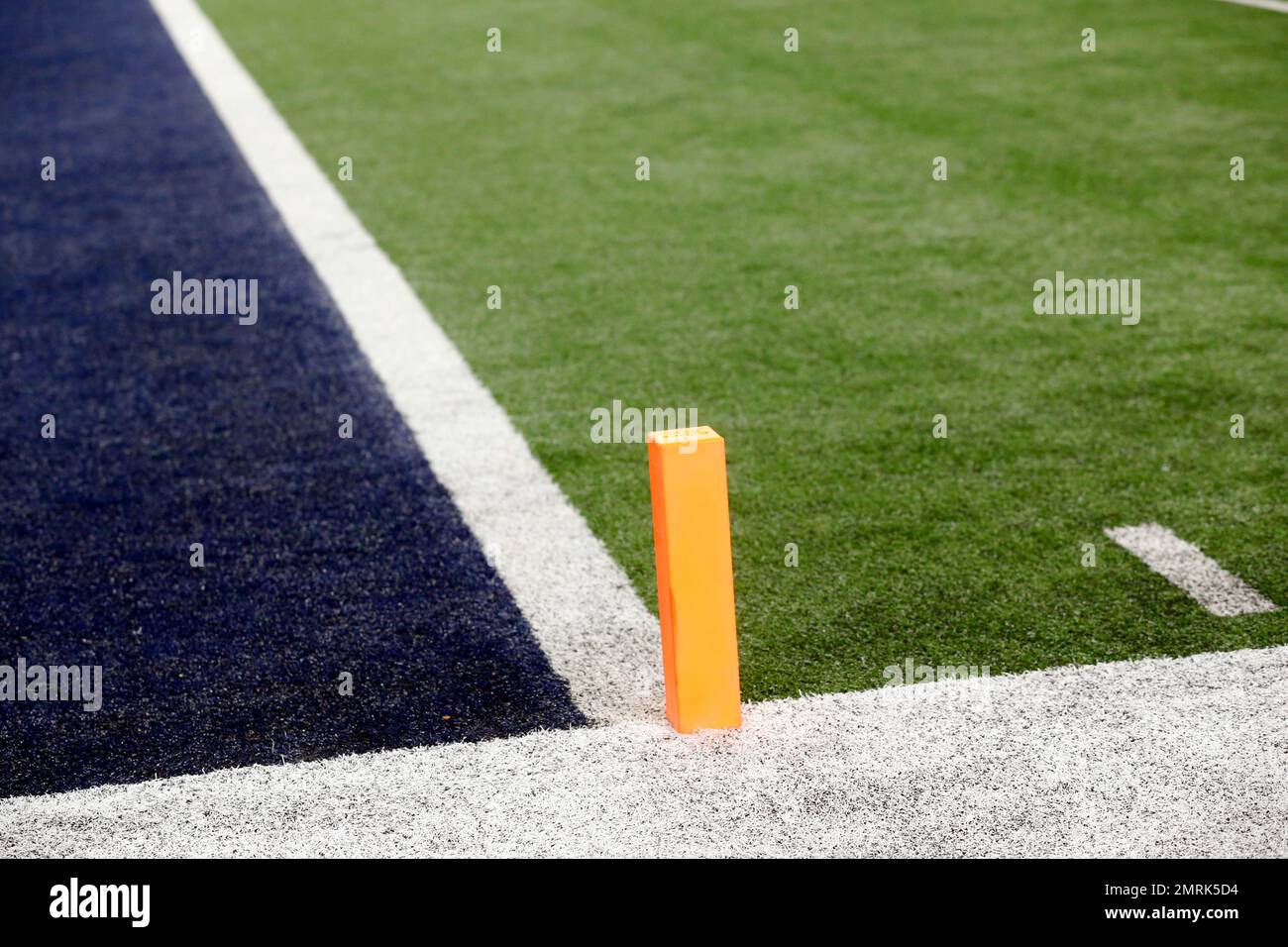 An end zone pylon is seen on the field during an NFL football game