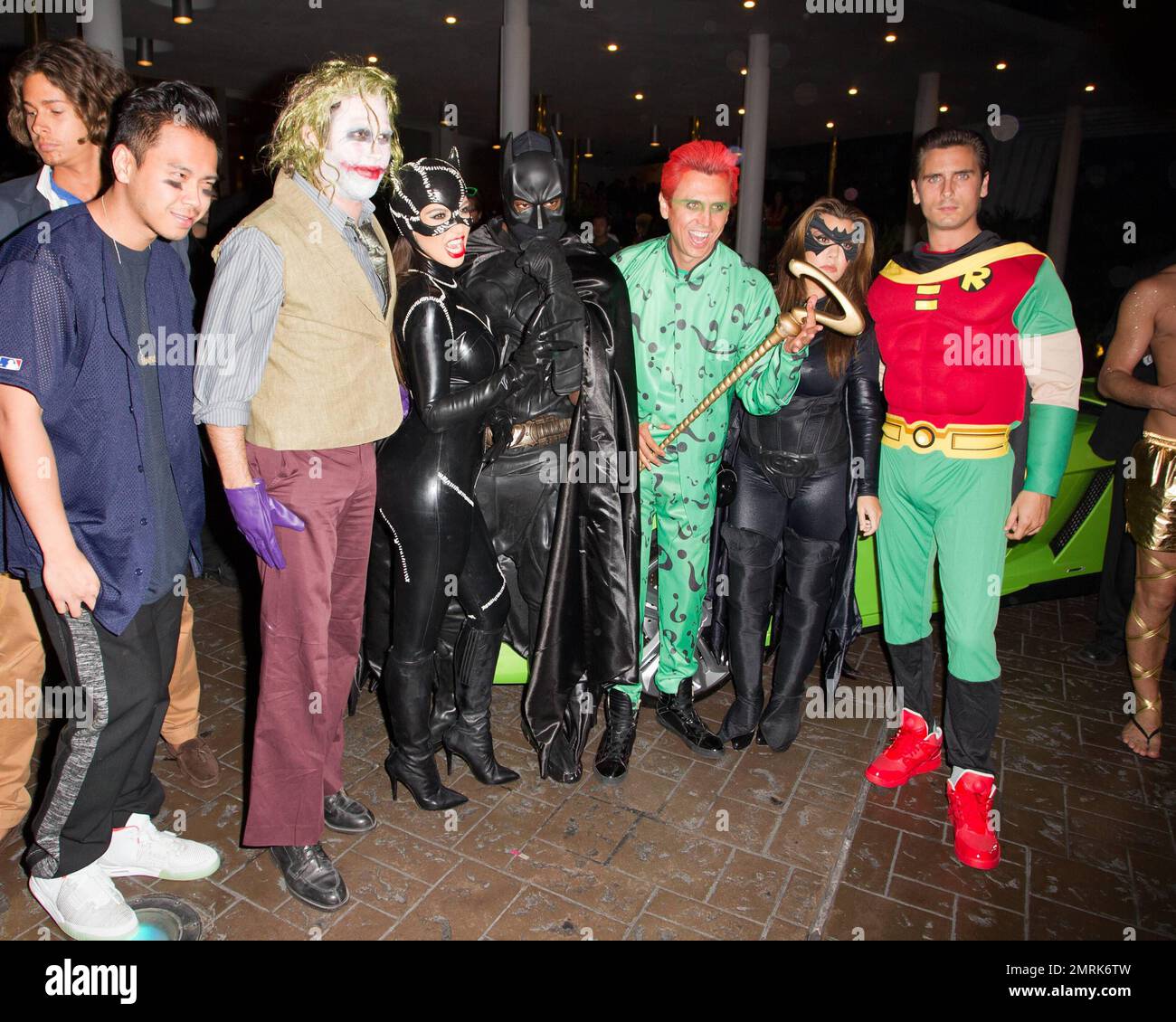 Arriving in a gold Lamborghini and dressed as the 'Cat Woman' Kim Kardashian arrives at LIV at Fountainebleau Miami Beach to celebrate her Halloween Birthday Bash. Joining the 'Batman' crew was Kayne West as 'Batman,' Kourtney Kardashian as 'Batgirl,' Scott Disick as 'Robin' and Jonathan Cheban as the 'Riddler.' Miami Beach, FL. 31st October 2012. Stock Photo