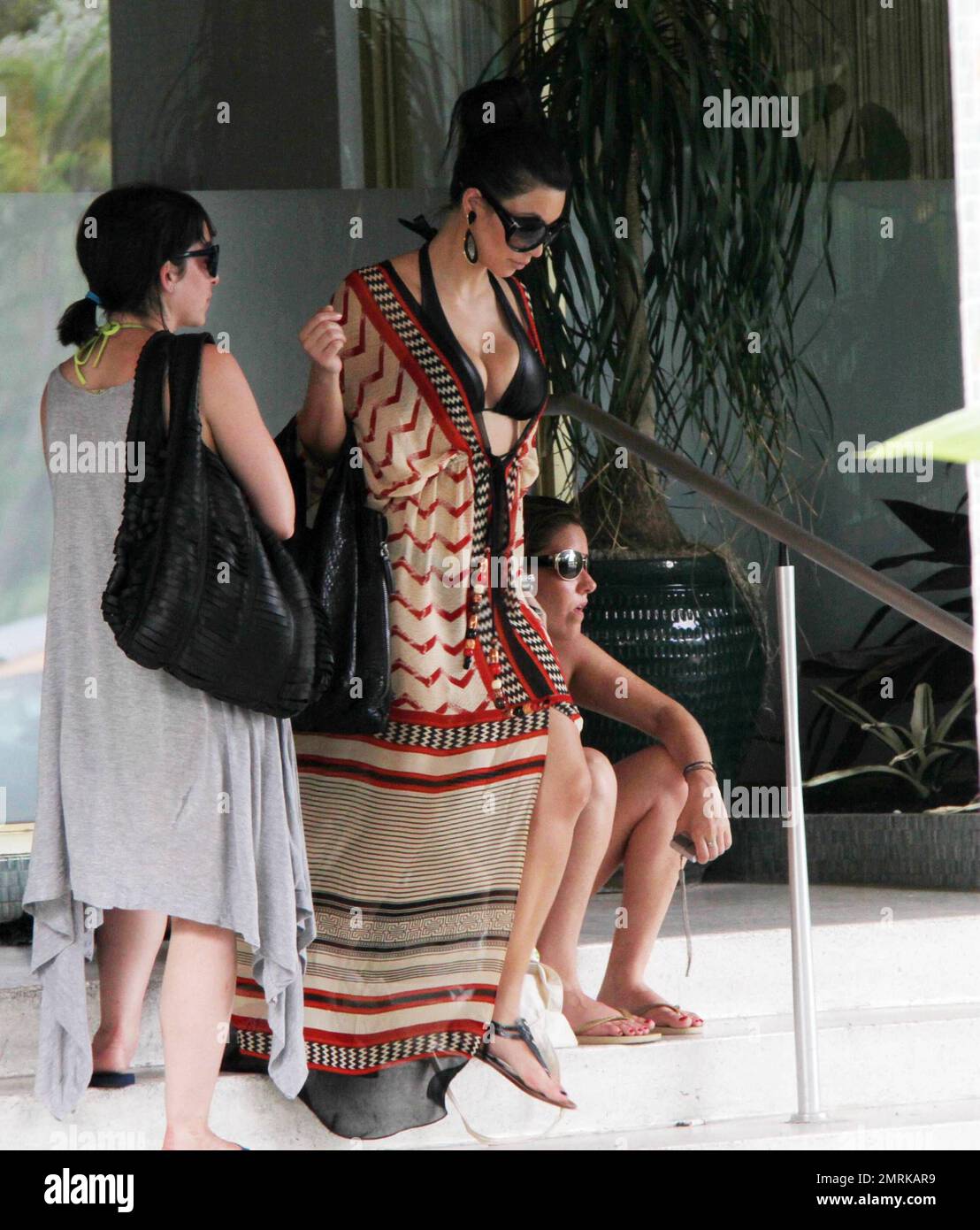 A busty Kim Kardashian leaves a luxury Miami hotel while out celebrating a friends bachelorette party. Miami Beach, FL. 6/11/10 Stock Photo - Alamy A busty Kim Kardashian leaves a luxury Miami hotel while out celebrating a friends bachelorette party. Miami Beach, FL. 6/11/10 Stock Photo - Alamy