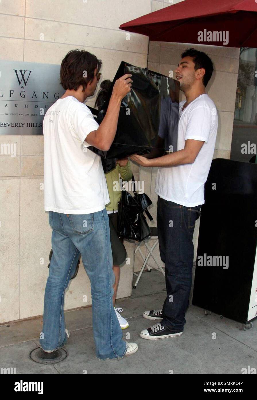 SHOPPERS with LOUIS VUITTON SHOPPING BAGS Editorial Image - Image of  tourists, editorial: 99360025