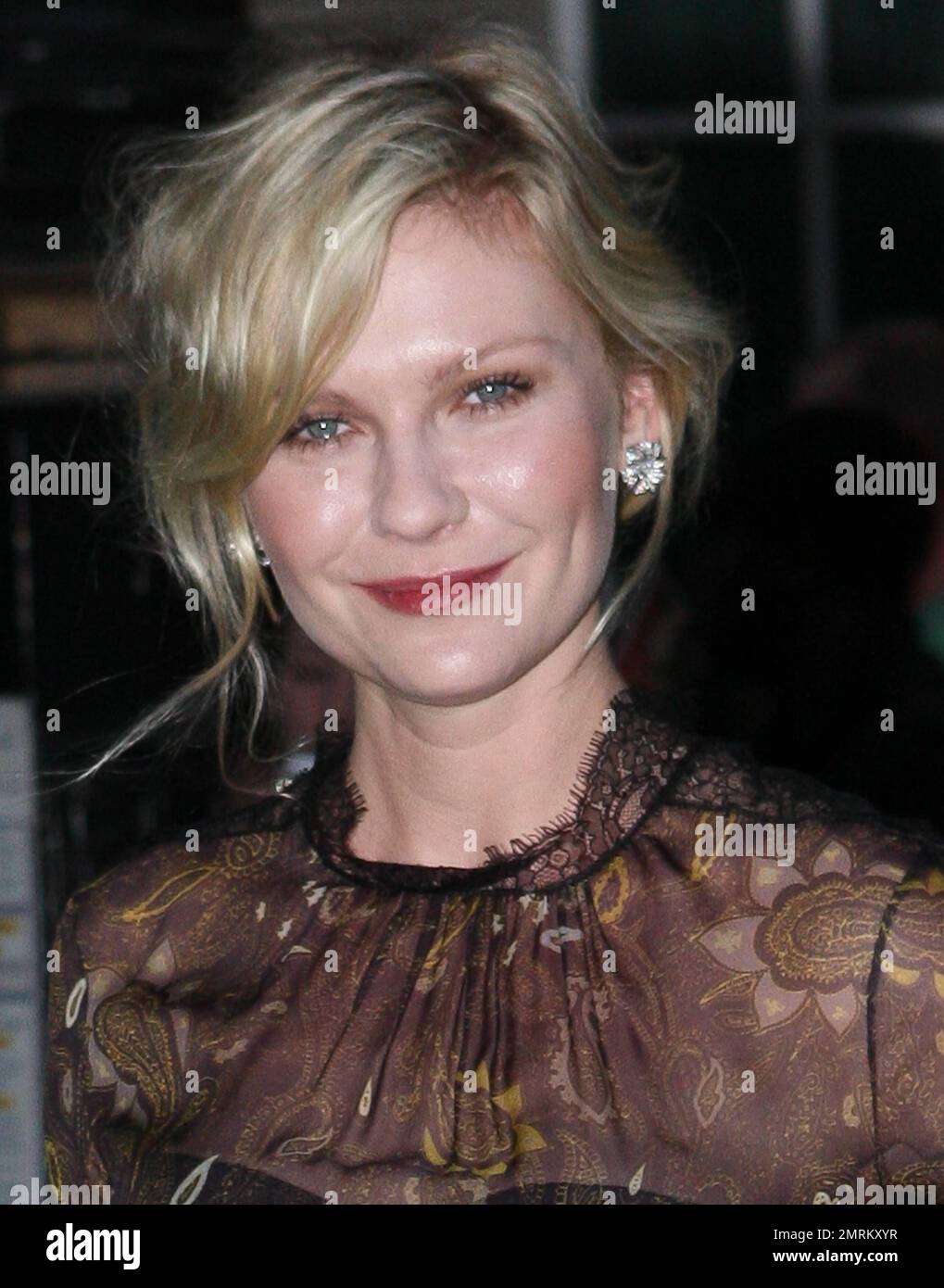 Kirsten Dunst poses for photos at the premiere of 