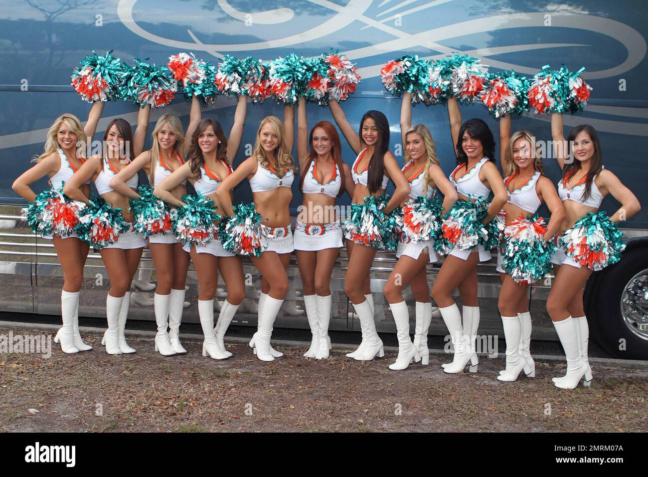 Clad in their famous white bikini tops and mini skirts, the Miami