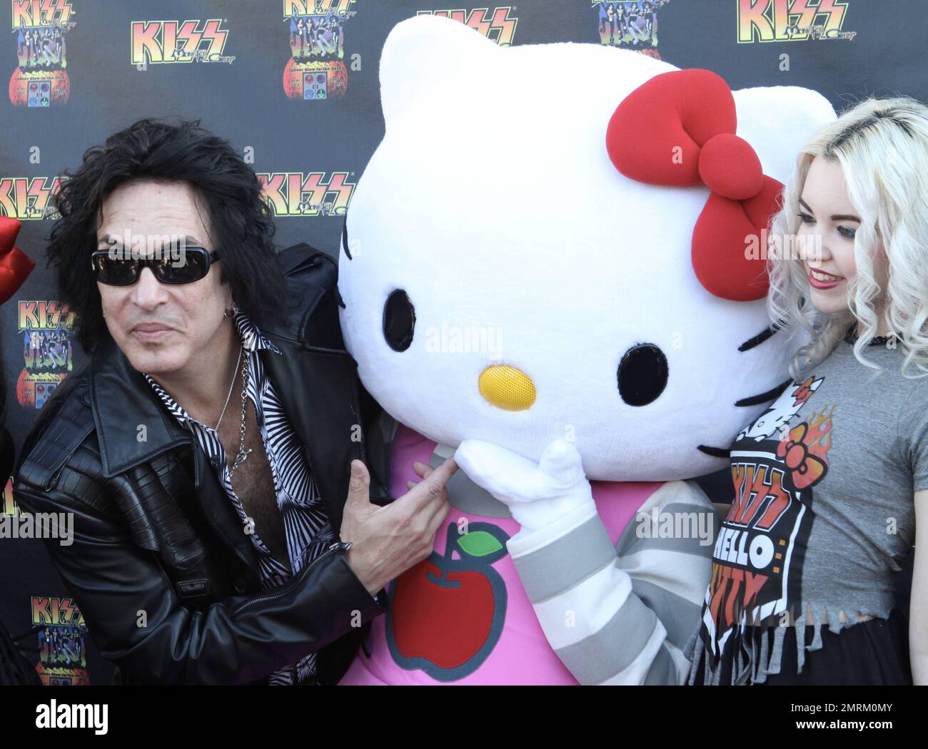 Paul Stanley poses with Hello Kitty at the KISS by Monster Mini