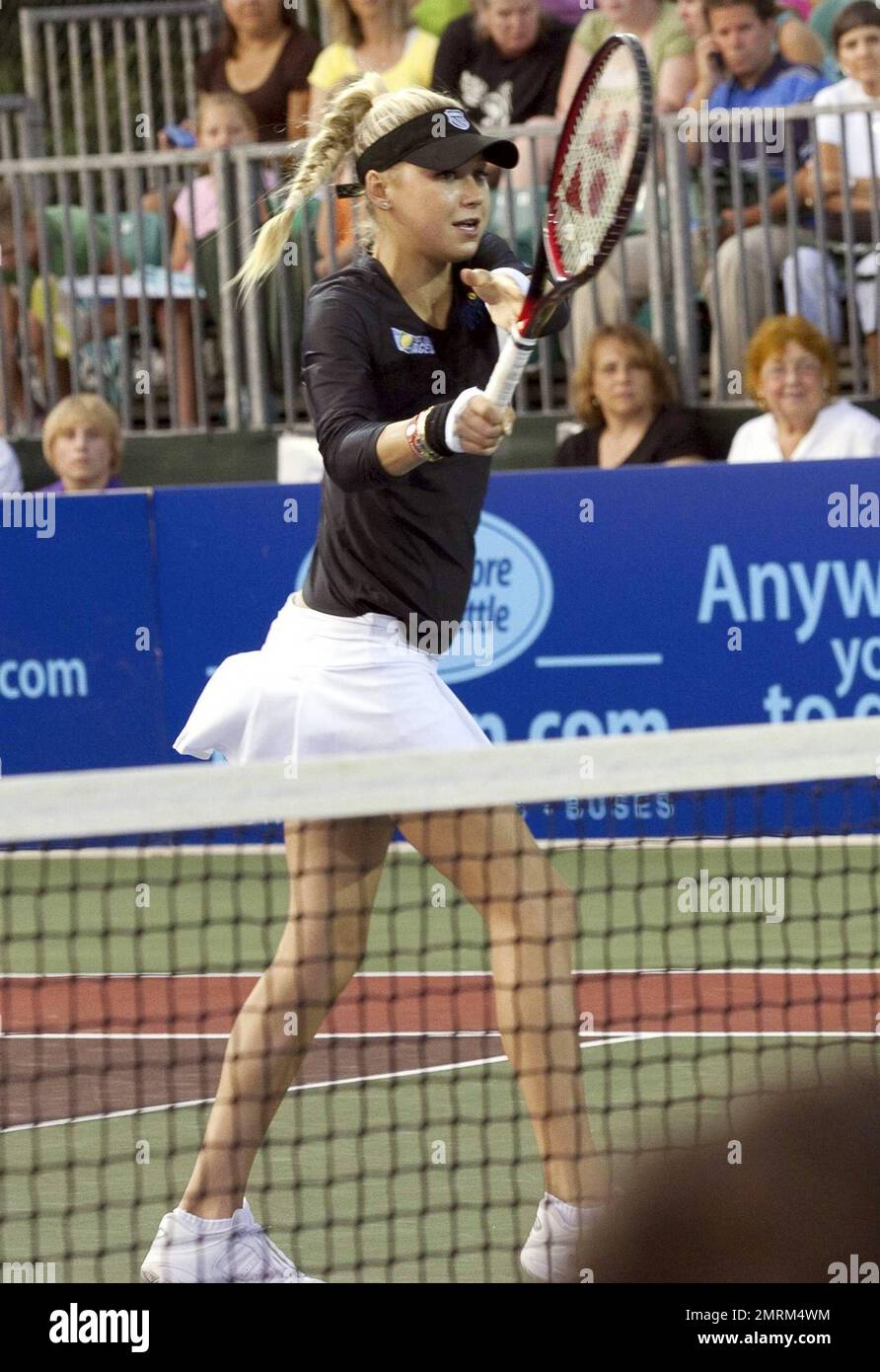 Anna Kournikova plays in the women's doubles match with the St. Louis Aces  during their game against the Boston Lobsters in the WTT Professional Tennis  League tournament at Ferncroft Country Club. The