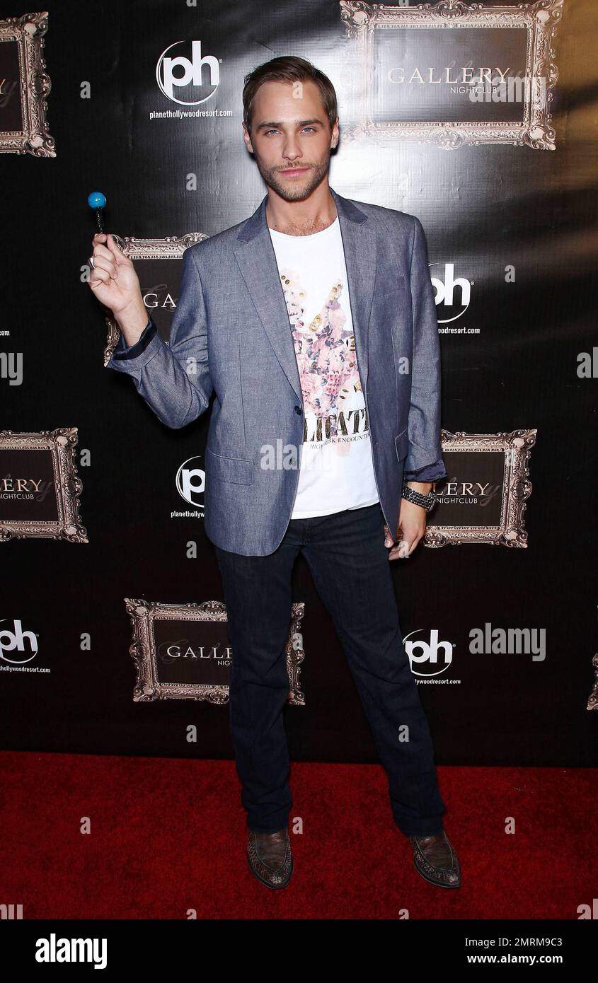 Josh Strickland poses for photographers at Gallery Nightclub inside