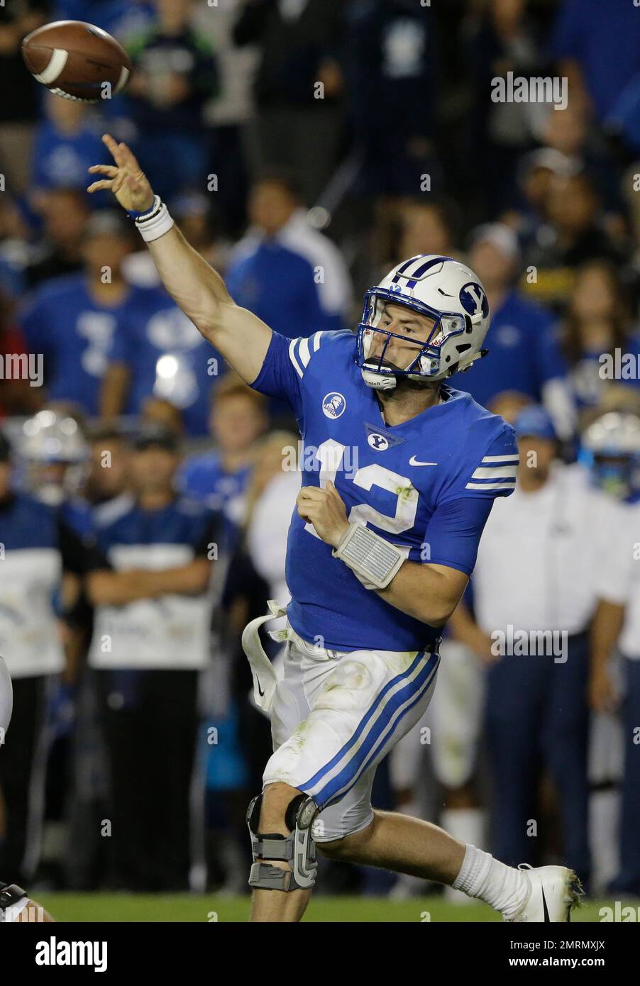 BYU quarterback Tanner Mangum (12) passes the ball against Utah in the