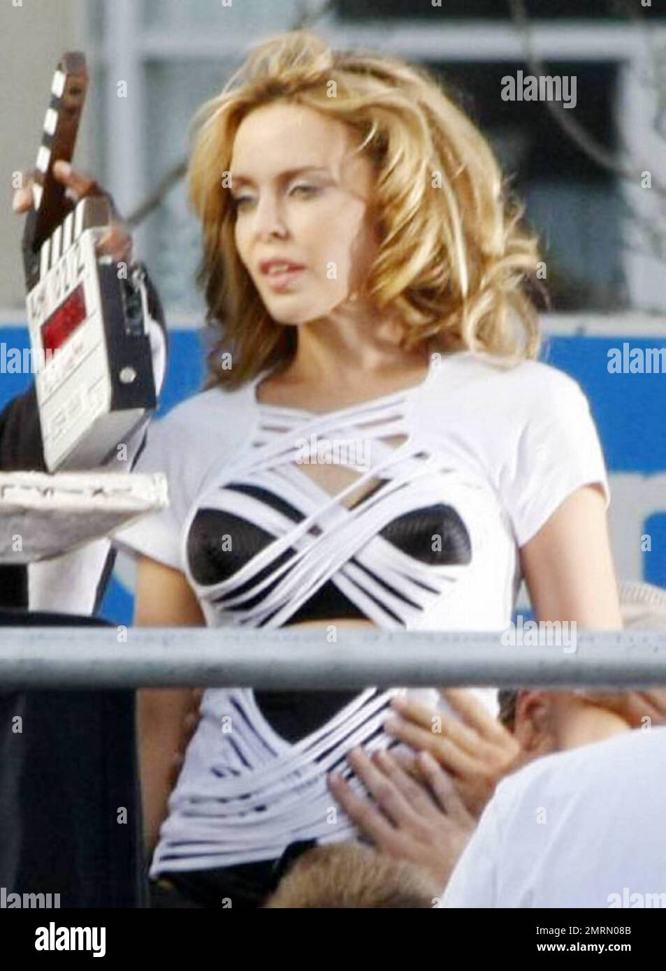 Pop singer Kylie Minogue shoots a new music video in downtown L.A., wearing white platform knee-high boots and a revealing top.  Minogue, 41, has recently denied rumors that she is planning to wed Spanish boyfriend Andres Velencoso Segura, 32, reportedly saying that marriage might not be a path she'll ever go down.  Minogue's eleventh studio album Aphrodite is set to be released this July. Los Angeles, CA. 05/08/10. Stock Photo