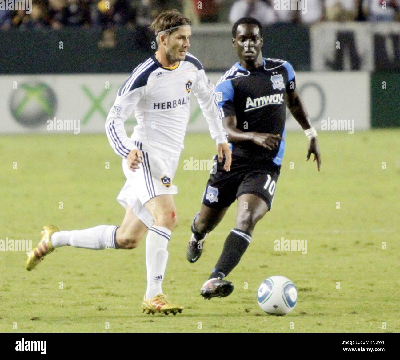 Robbie Keane all smiles as he plays ball with David Beckham