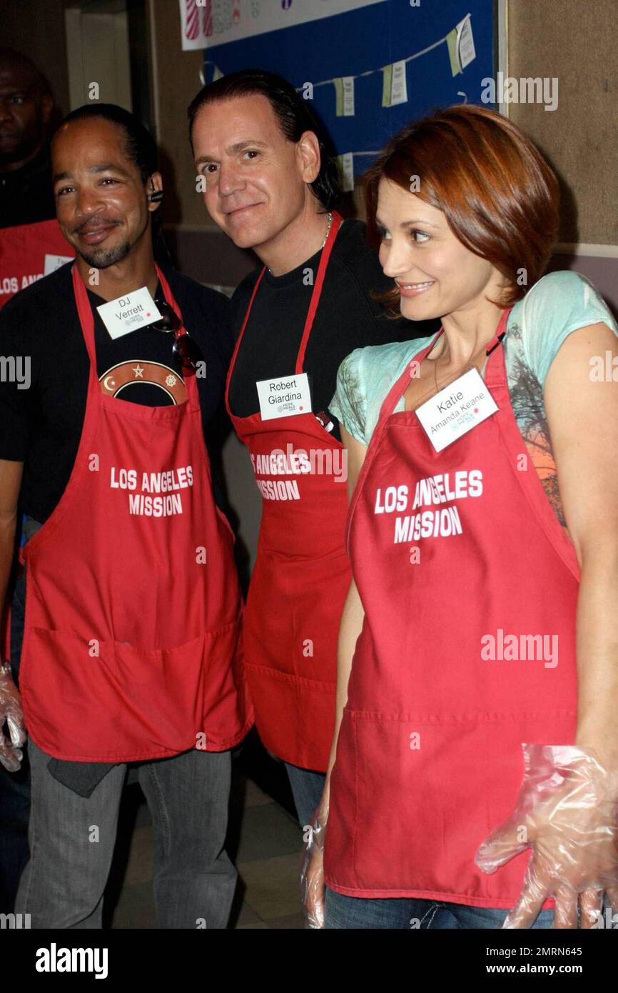 Robert Giardina, DJ Verrett and Katie Amanda Keane participate in the Los Angeles Mission Good Friday Event that features hundreds of volunteers serving the homeless. The event also included a foot washing tent and a shoe fitting area. Los Angeles, CA. 4/10/09.   .  . Stock Photo