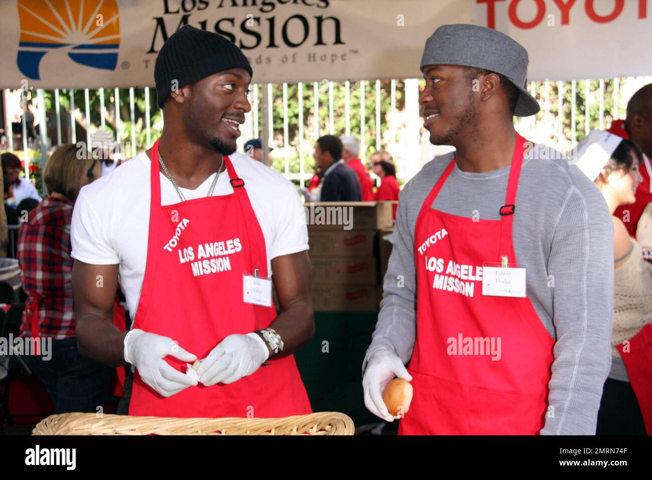 Aldis and Edwin Hodge feed the homeless at the Los Angeles Mission on