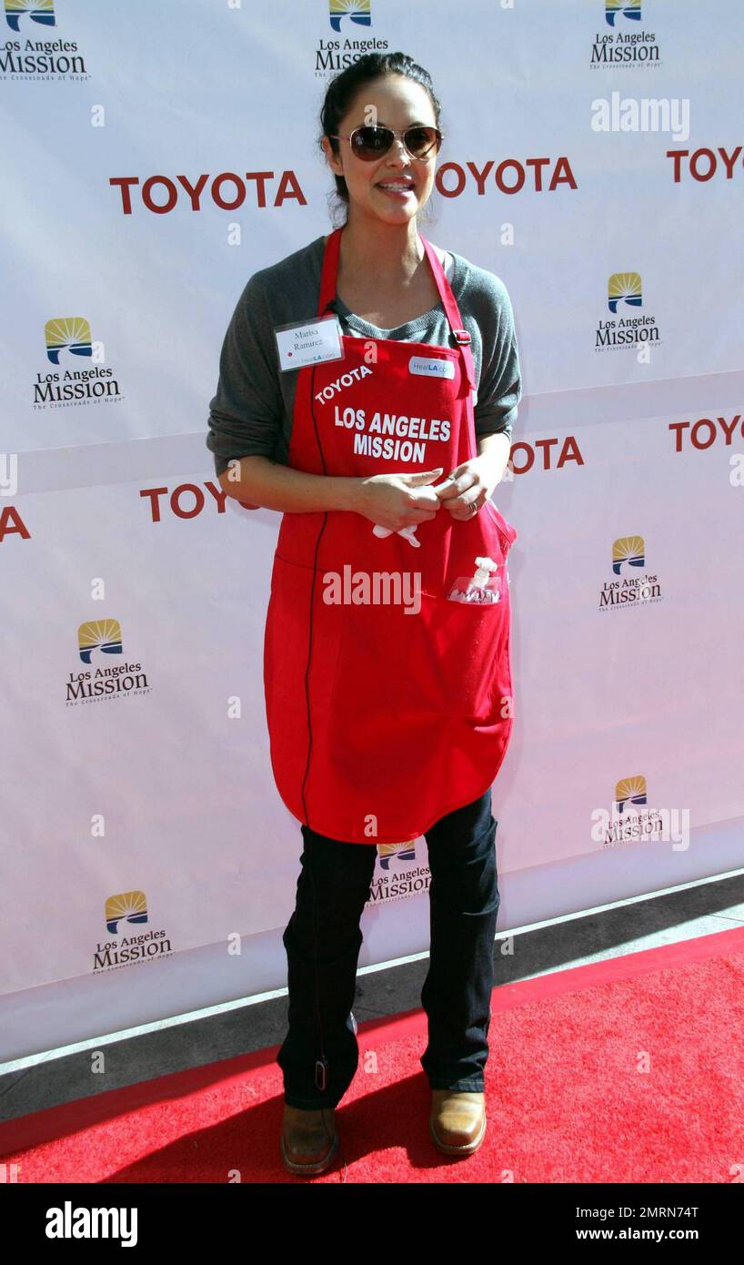 Marisa Ramirez feeds the homeless at the Los Angeles Mission on