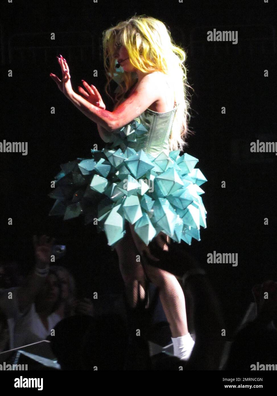 Lady Gaga undergoes several costume changes as she performs live at the  Amway Center, where she also made a point to flash her bum to the audience  while wearing her clear rubber