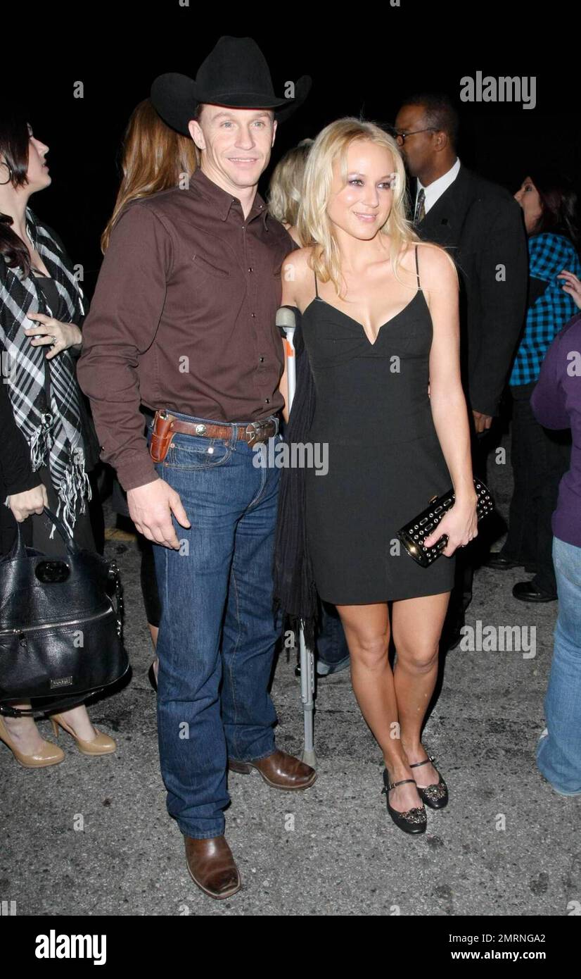 Jewel, using crutches to nurse an injury, arrives with husband and 'Dancing with the Stars' challenger Ty Murray at the Star Magazine Lady Gaga concert at the nightclub Apple in Los Angeles, CA. 3/11/09. Stock Photo