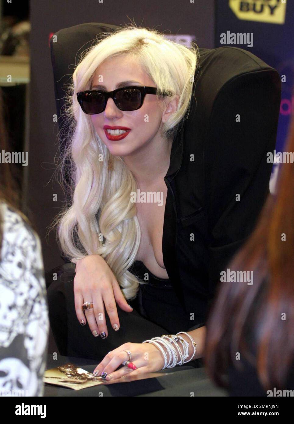 - Lady Gaga meets her fans at electronics store Best Buy in Los Angeles. The singer, real name Stefani Joanne Angelina Germanotta, was at the store to sign copies of her latest album entitled 'The Fame Monster.' Los Angeles, CA. 11/23/09. Stock Photo