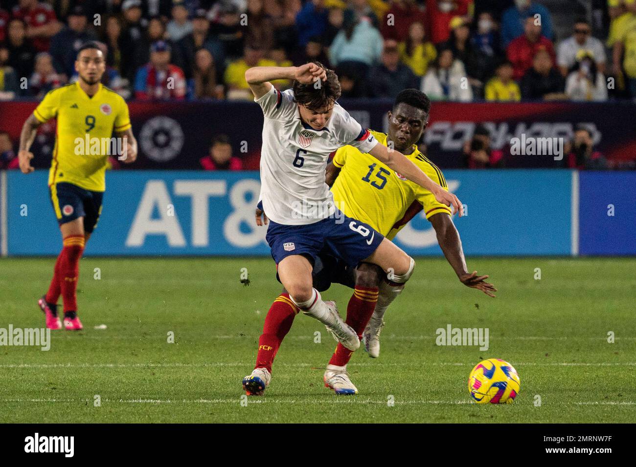 United States of America midfielder Paxten Aaronson (6) is fouled by Colombia midfielder Yilmar Velasquez (15) during an international friendly match, Stock Photo