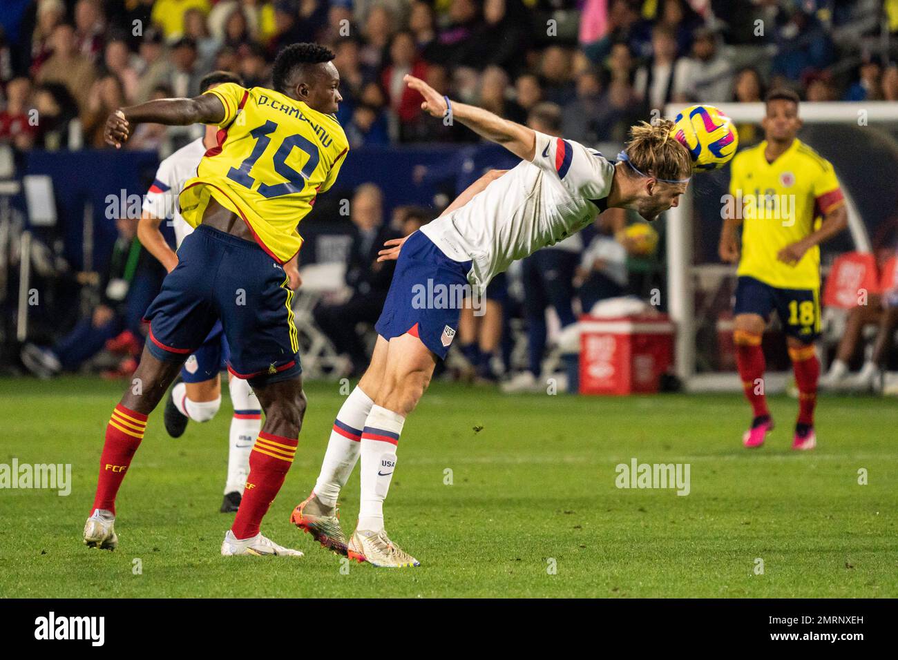 United States of America defender Walker Zimmerman (3) wins a header against Colombia forward Diber Cambindo (19) during an international friendly mat Stock Photo