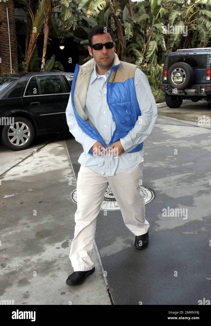 Adam Sandler arrives at the Staples Center for the Los Angeles Lakers ...