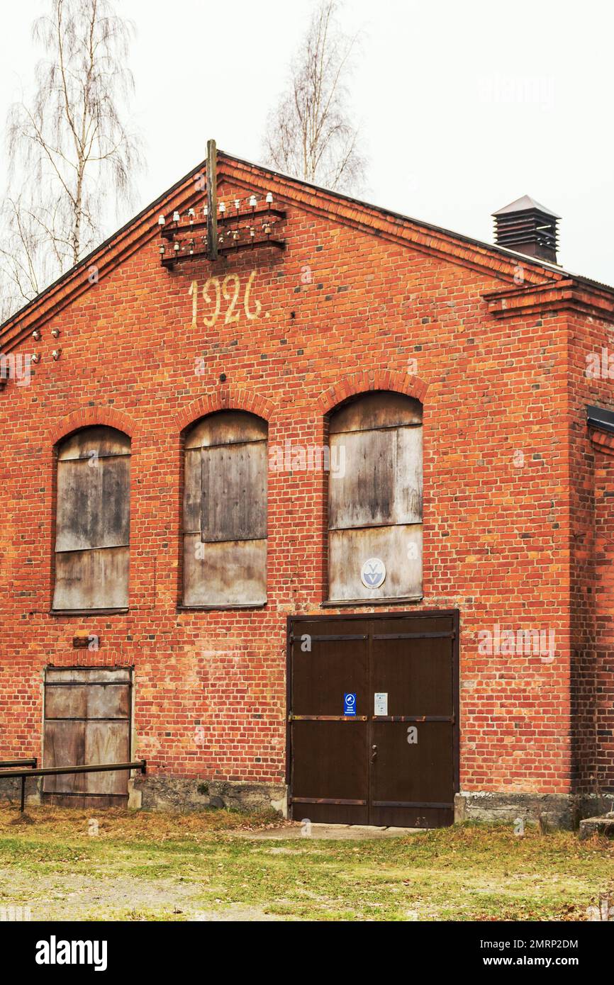 Old red brick industrial building built in 1926  at Varikonniemi in Hämeenlinna Finland Stock Photo