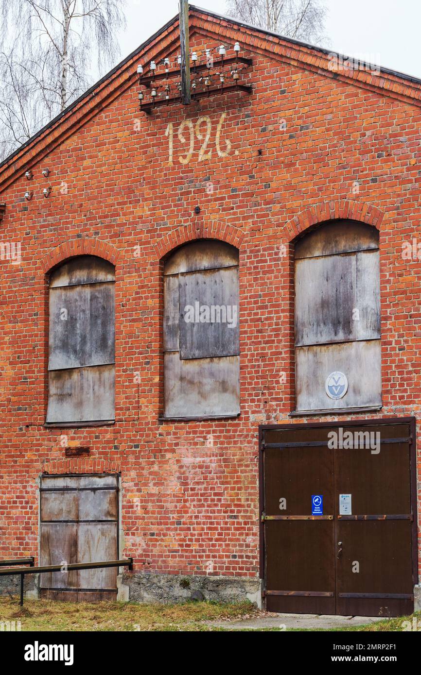 Old red brick industrial building built in 1926  at Varikonniemi in Hämeenlinna Finland Stock Photo