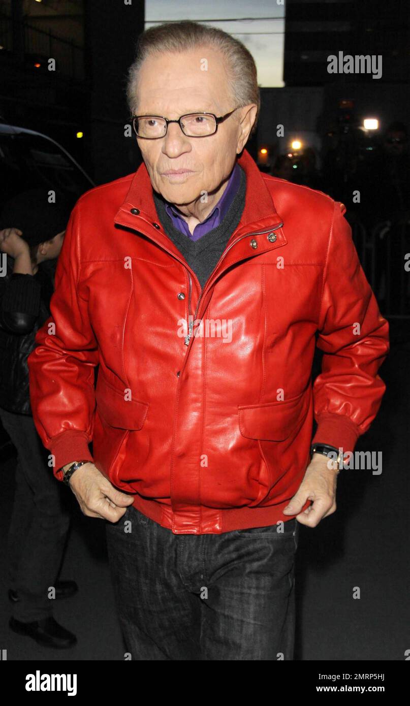 In a red leather jacket Larry King arrives at the CNN building