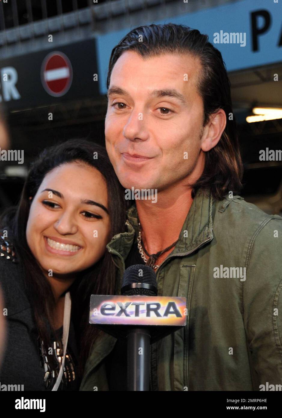 Gavin Rossdale poses with fans without his sunglasses as he arrives to CNN studios for the Larry King Live: Disaster in the Gulf Telethon hosted by American Idol's Ryan Seacret.  Celebrities took calls throughout the two-hour show to help the people, animals and wildlife affected by the continuing oil leak in the Gulf of Mexico.  The event reportedly raised $1.7 million with donations going to the United Way, National Wildlife Federation or The Nature Conservancy.  The British Petroleum-leased oil well off the coast of Louisiana, which busted on April 20, has yet to be fully contained. Los Ang Stock Photo