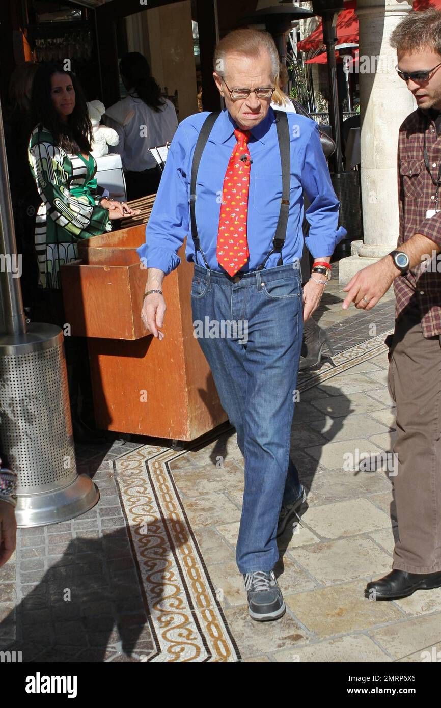 TV personality Larry King wears his trademark suspenders while out at the  Grove shopping center. King donned some jeans, sneakers and a patterned tie  for his outing where he posed for photos