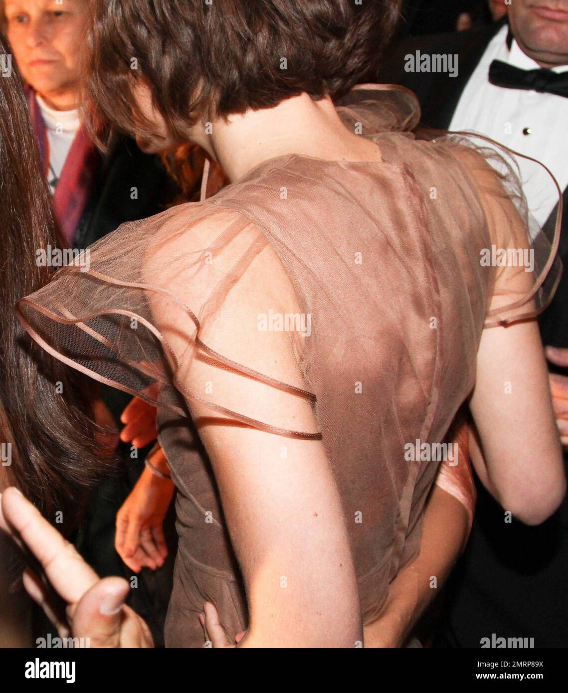 sachin and babi light blue dress Detail of actress Keira Knightley's tan dress outside of the Auditorium  Parco Della Musica where a protest by hundreds of Italian film industry  workers disrupted the planned premiere of 