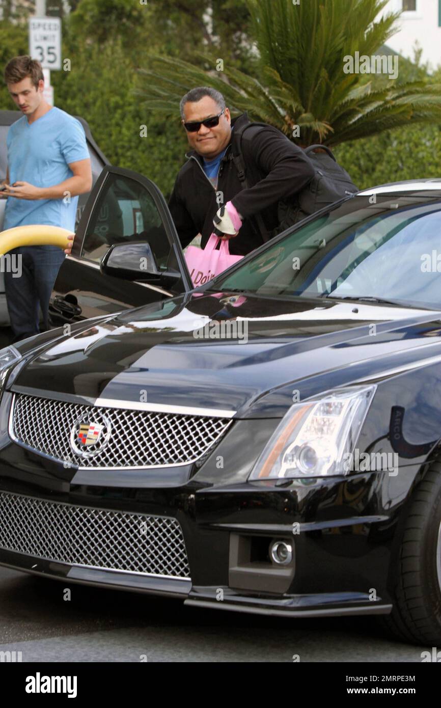 EXCLUSIVE!! Actor Laurence Fishburne looks frustrated as he waits for a