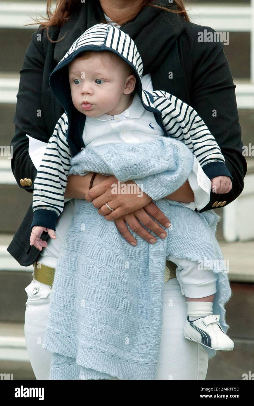 Boris Becker and Sharlely Becker's baby Amadeus being held by their nanny  while attending the Laureus Polo Cup match held at the Ham Polo Club.  Richmond, UK. 6/18/10 Stock Photo - Alamy