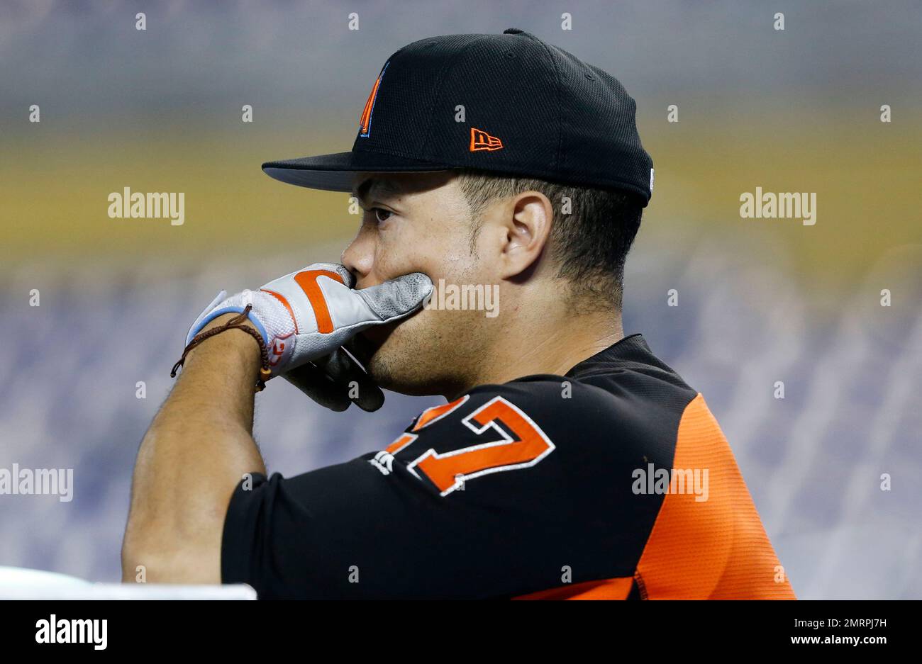 Miami Marlins' Giancarlo Stanton looks on during batting practice