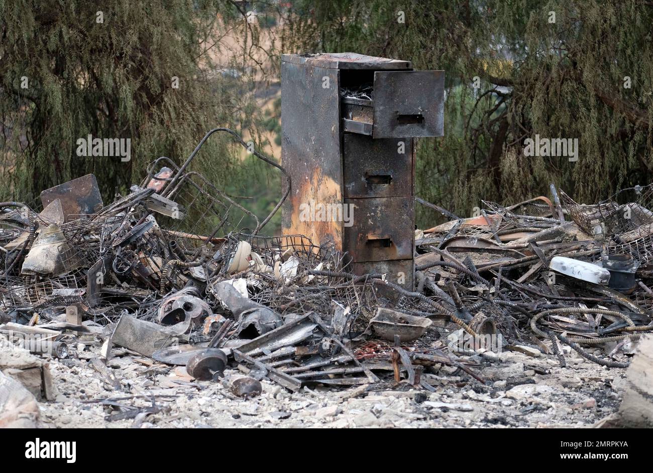 Sweltering Home The charred remains of a burned out home are seen Monday, Sept. 4, 2017 ...