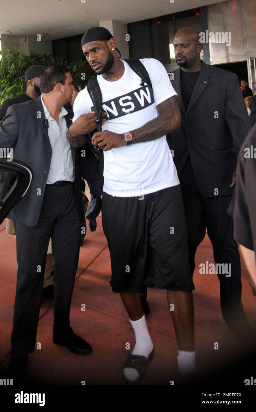 NBA superstar LeBron James is joined by an entourage as he leaves his