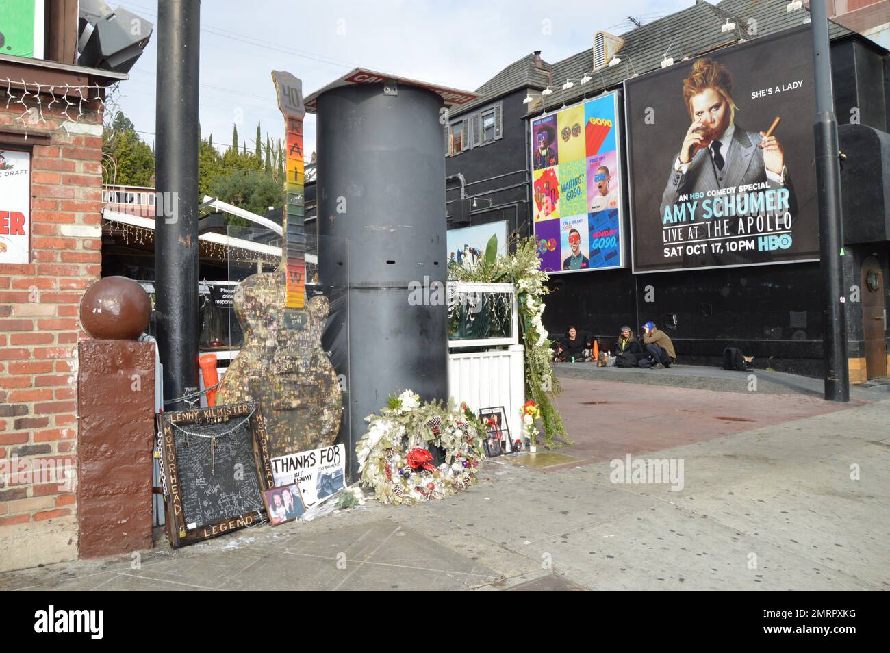 General view of tributes left outside the Rainbow Bar & Grill on the Sunset Strip in honor of Lemmy from the rock band Motorhead, in West Hollywood, CA. Also pictured is a touching note rocker Dave Grohl penned for his friend. Stock Photo