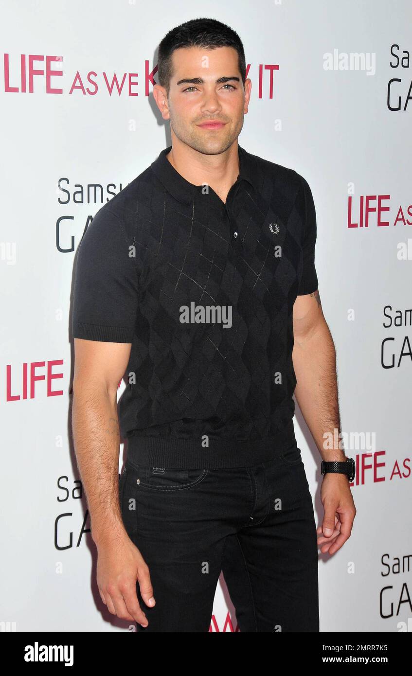 Jesse Metcalfe walks the red carpet at the premiere of Warner Bros