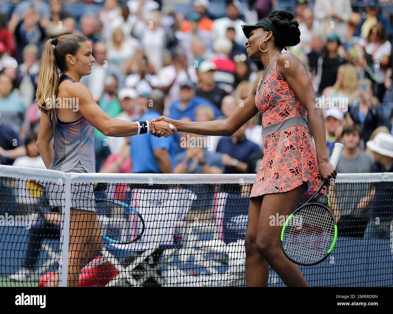 Venus Williams of the United States right shakes hands with Maria Sakkari of Greece after Williams won their third round match of the U.S. Open tennis tournament Friday Sept. 1 2017 in