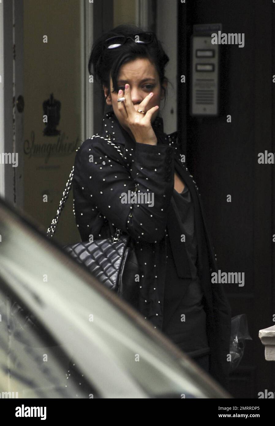 Lily allen smoking cigarette she hi-res stock photography and images